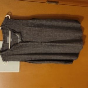 Sleeveless tunic length top, Front placket with 2 hidden buttons and one visible